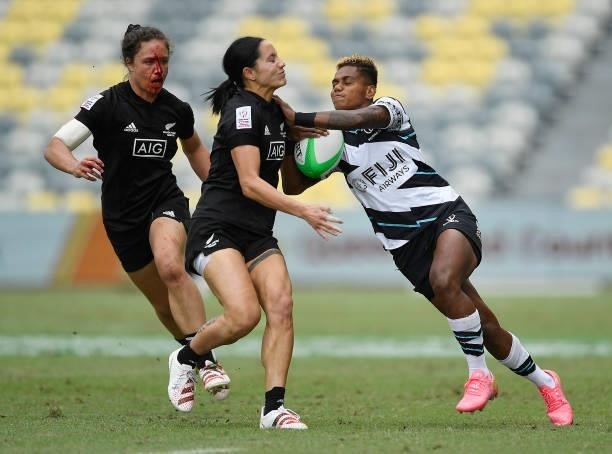 Roela Radiniyavuna of Fiji is tackled during the Oceania Sevens Challenge match between New Zealand and Fiji at Queensland Country Bank Stadium on...