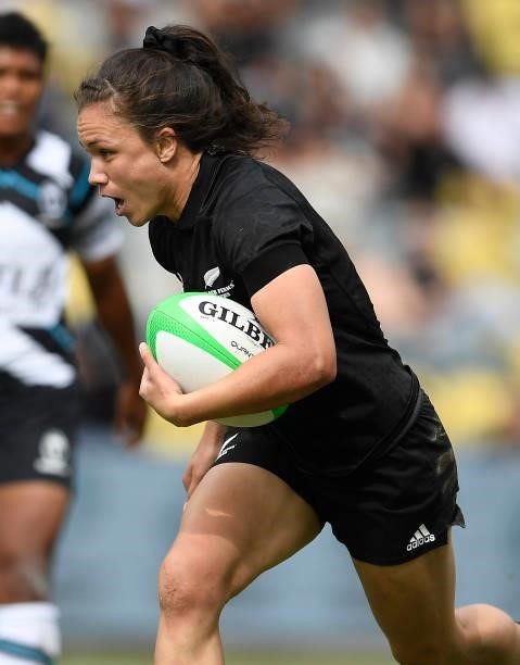 Ruby Tui of New Zealand runs the ball during the Oceania Sevens Challenge match between New Zealand and Fiji at Queensland Country Bank Stadium on...