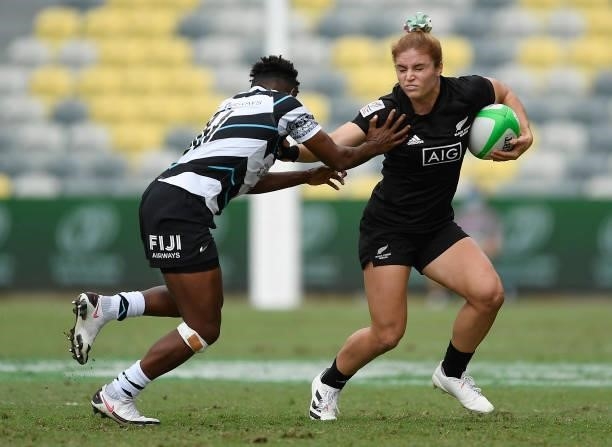 Michaela Blyde of New Zealand attempts to get past Ana Naimasi of Fiji during the Oceania Sevens Challenge match between New Zealand and Fiji at...