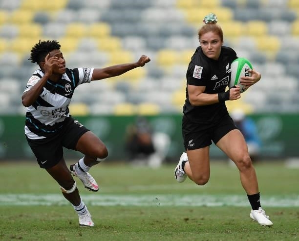 Michaela Blyde of New Zealand attempts to get past Ana Naimasi of Fiji during the Oceania Sevens Challenge match between New Zealand and Fiji at...