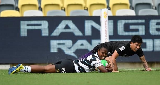 Raijeli Daveua of Fiji scores a try during the Oceania Sevens Challenge match between New Zealand and Fiji at Queensland Country Bank Stadium on June...