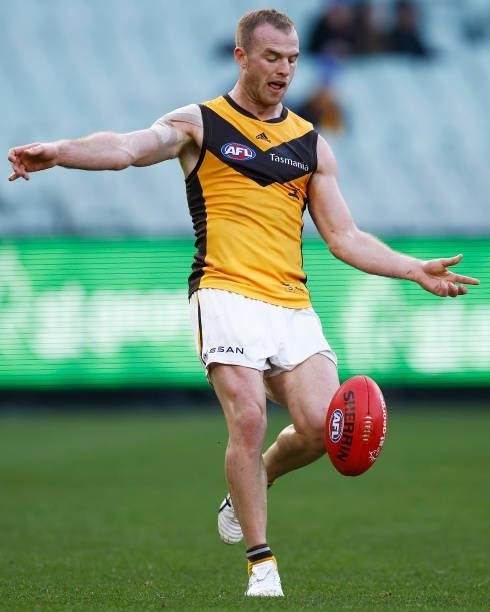 Tom Mitchell of the Hawks kicks the ball during the round 15 AFL match between the Greater Western Sydney Giants and the Hawthorn Hawks at Melbourne...