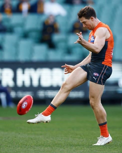 Toby Greene of the Giants kicks a goal during the round 15 AFL match between the Greater Western Sydney Giants and the Hawthorn Hawks at Melbourne...