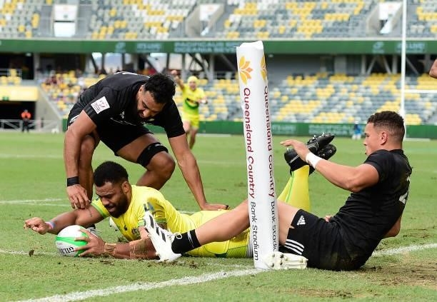 Samu Kerevi of Australia scores a try during the Oceania Sevens Challenge match between New Zealand and Australia at Queensland Country Bank Stadium...