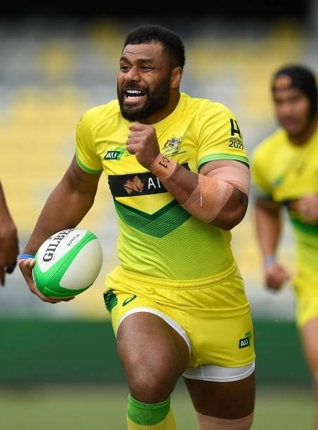 Samu Kerevi of Australia runs the ball during the Oceania Sevens Challenge match between New Zealand and Australia at Queensland Country Bank Stadium...