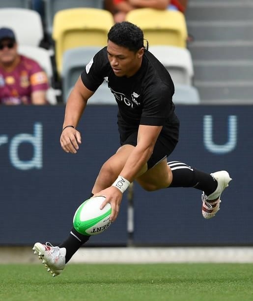 Caleb Clark of New Zealand scores a try during the Oceania Sevens Challenge match between New Zealand and Australia at Queensland Country Bank...