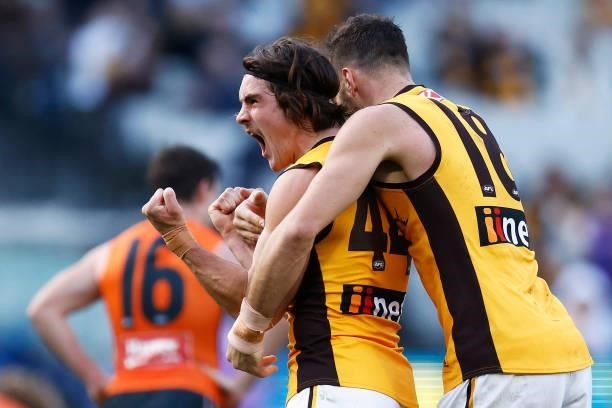 Jai Newcombe of the Hawks celebrates a goal during the round 15 AFL match between the Greater Western Sydney Giants and the Hawthorn Hawks at...