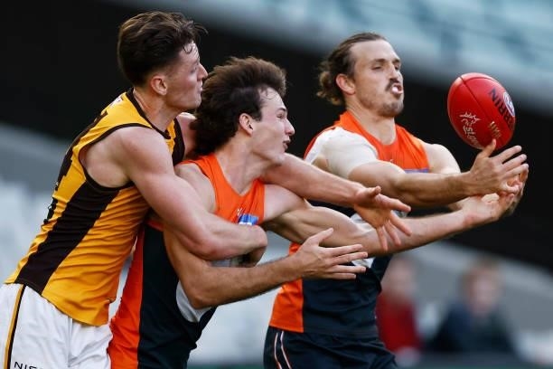 Phil Davis of the Giants spoils the ball during the round 15 AFL match between the Greater Western Sydney Giants and the Hawthorn Hawks at Melbourne...