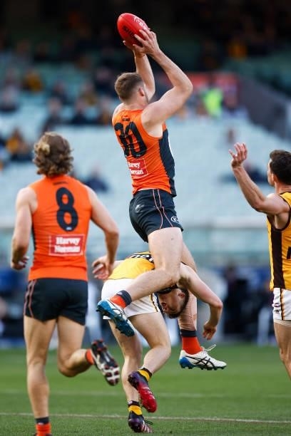 Matthew Flynn of the Giants marks the ball during the round 15 AFL match between the Greater Western Sydney Giants and the Hawthorn Hawks at...