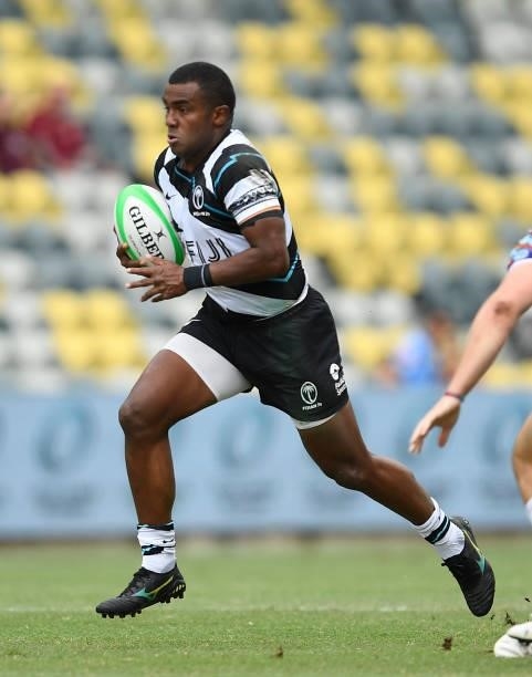 Kitione Taliga of Fiji runs the ball during the Oceania Sevens Challenge match between Fiji and Oceania at Queensland Country Bank Stadium on June...