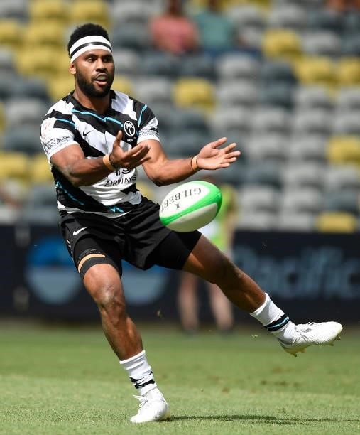 Vilimoni Botitu of Fiji is passes the ball during the Oceania Sevens Challenge match between Fiji and Oceania at Queensland Country Bank Stadium on...