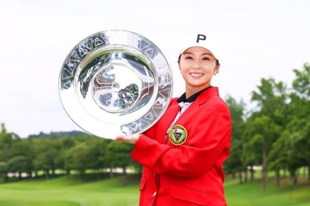 Erika Kikuchi of Japan poses with the trophy after winning the tournament following the final round of the Earth Mondamin Cup at Camellia Hills...