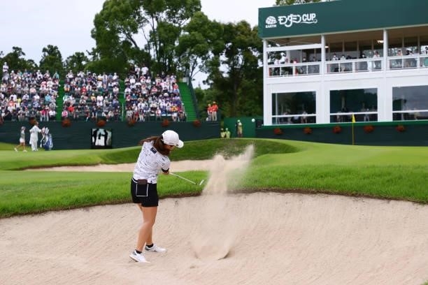 Erika Kikuchi of Japan hits out from a bunker on the 18th hole during the final round of the Earth Mondamin Cup at Camellia Hills Country Club on...