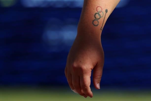 Detail of the Olympic tattoo of DeAnna Price competes in the Women's Hammer Throw final on day nine of the 2020 U.S. Olympic Track & Field Team...