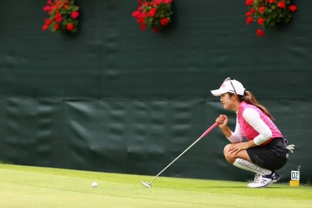 Nanoko Hayashi of Japan lines up a putt on the 18th green during the final round of the Earth Mondamin Cup at Camellia Hills Country Club on June 27,...