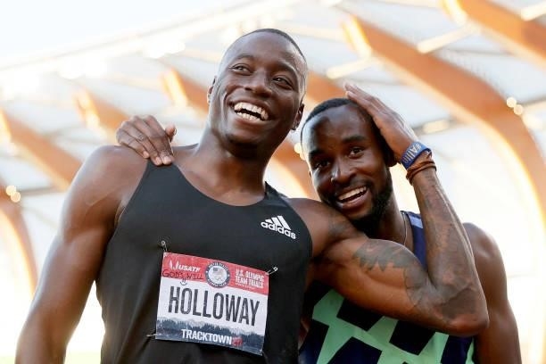 Grant Holloway, first, and Daniel Roberts, third, celebrate after the Men's 110 Meters Hurdle Final on day nine of the 2020 U.S. Olympic Track &...