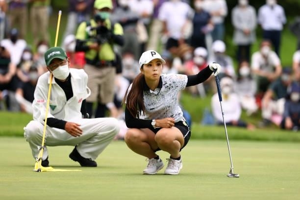 Erika Kikuchi of Japan lines up a putt on the 18th green during the final round of the Earth Mondamin Cup at Camellia Hills Country Club on June 27,...