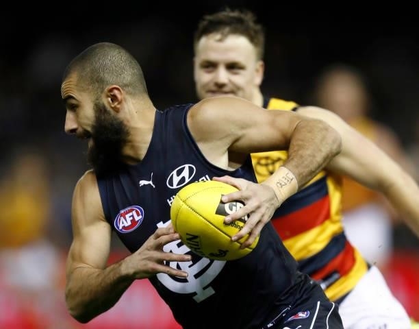 Adam Saad of the Blues runs with the ball during the round 15 AFL match between the Carlton Blues and the Adelaide Crows at Marvel Stadium on June...