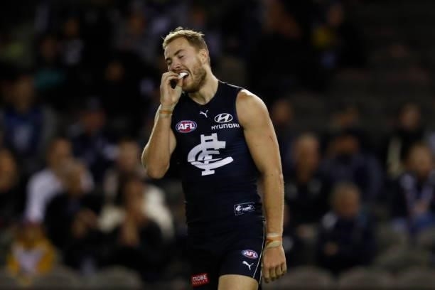 Harry McKay of the Blues reacts after missing a goal during the round 15 AFL match between the Carlton Blues and the Adelaide Crows at Marvel Stadium...