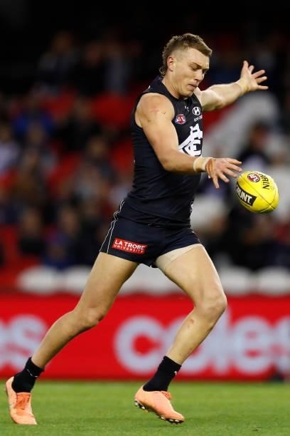Patrick Cripps of the Blues kicks the ball during the round 15 AFL match between the Carlton Blues and the Adelaide Crows at Marvel Stadium on June...