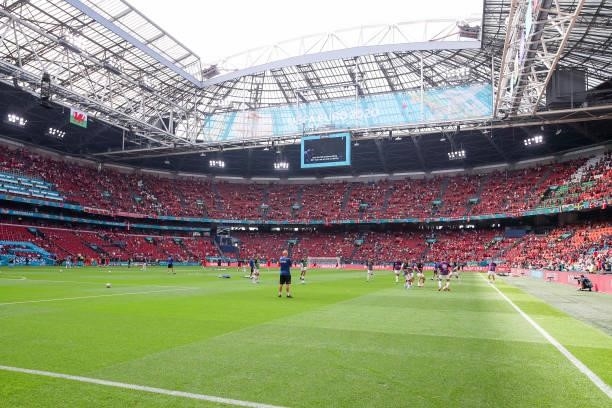 Warming up team Denmark during the UEFA Euro 2020 Championship 1/8 final match between Wales and Denmark at the Johan Cruijff ArenA on June 26, 2021...