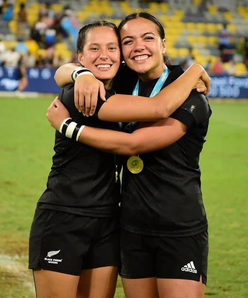 Tyla Nathan-Wong and Stacey Waaka of New Zealand pose after winning the Oceania Sevens Challenge at Queensland Country Bank Stadium on June 27, 2021...