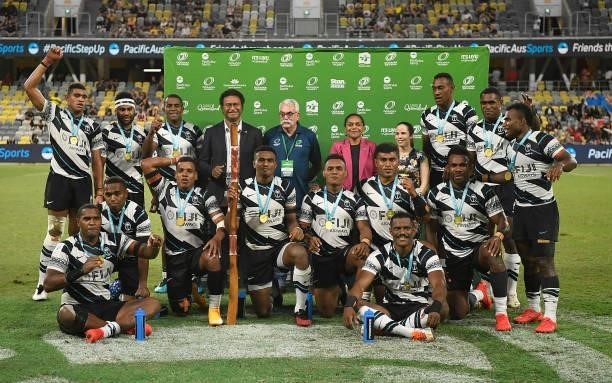 The Fiji team pose for a photo after winning the Oceania Sevens Challenge at Queensland Country Bank Stadium on June 27, 2021 in Townsville,...