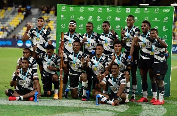 The Fiji team pose for a photo after winning the Oceania Sevens Challenge at Queensland Country Bank Stadium on June 27, 2021 in Townsville,...
