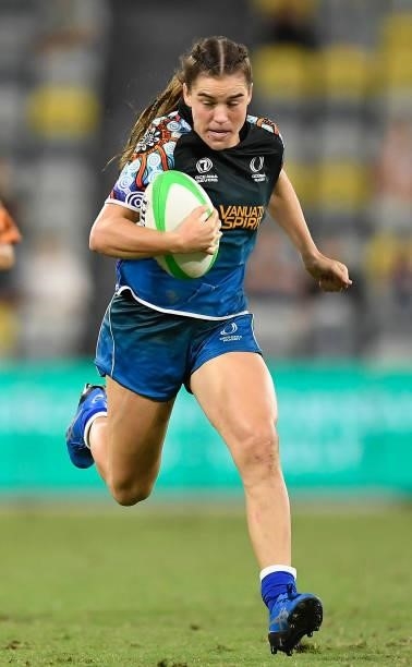 Jakiya Whitfeld of Oceania runs the ball during the Oceania Sevens Challenge match between Fiji and Oceania at Queensland Country Bank Stadium on...