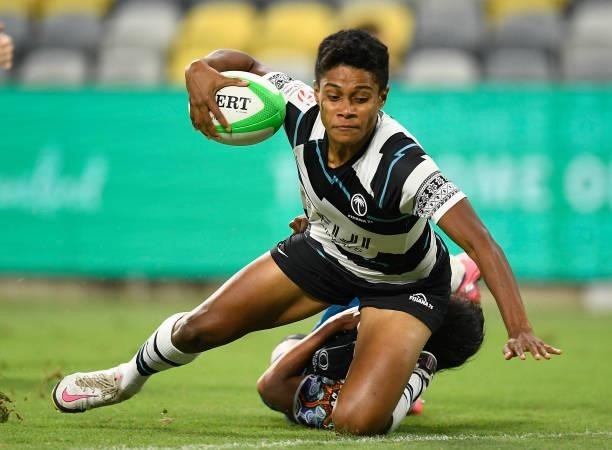 Sesenieli Donu of Fiji scores a try during the Oceania Sevens Challenge match between Fiji and Oceania at Queensland Country Bank Stadium on June 27,...