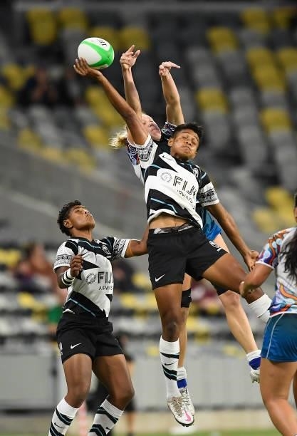 Sesenieli Donu of Fiji scores contest the ball with Maddison Levi of Oceania during the Oceania Sevens Challenge match between Fiji and Oceania at...