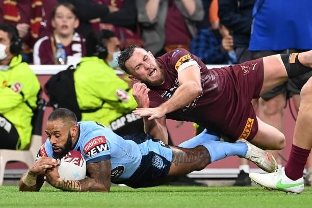 Josh Addo-Carr of the Blues scores a try during game two of the 2021 State of Origin series between the Queensland Maroons and the New South Wales...