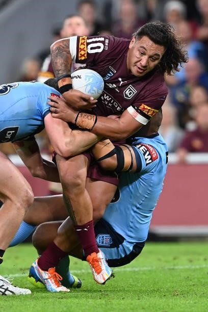 Josh Papalii of the Maroons is tackled during game two of the 2021 State of Origin series between the Queensland Maroons and the New South Wales...