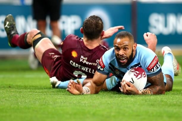 Josh Addo-Carr of the Blues dives over to score a try during game two of the 2021 State of Origin series between the Queensland Maroons and the New...