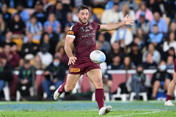 Ben Hunt of the Maroons kicks the ball during game two of the 2021 State of Origin series between the Queensland Maroons and the New South Wales...
