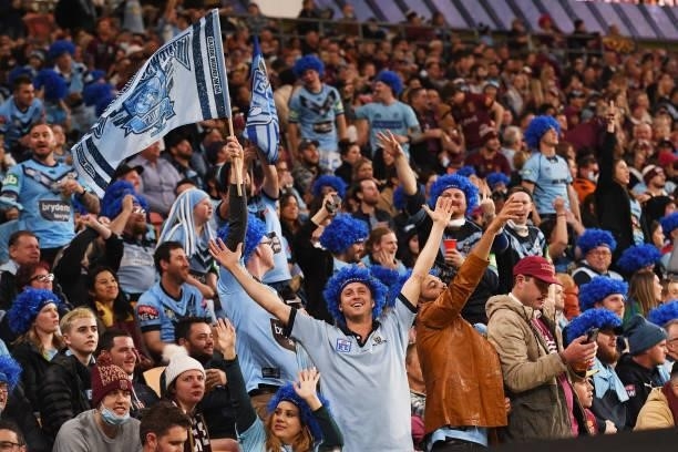Blues fans show their support during game two of the 2021 State of Origin series between the Queensland Maroons and the New South Wales Blues at...