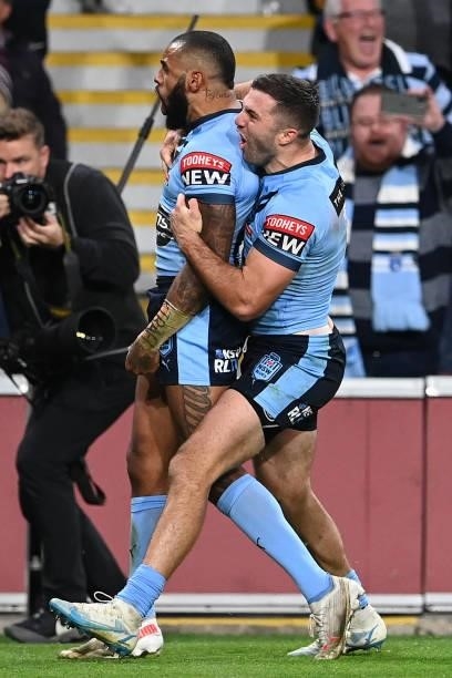 Josh Addo-Carr of the Blues celebrates with team mates after scoring a try during game two of the 2021 State of Origin series between the Queensland...