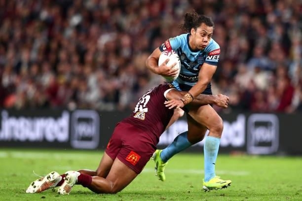 Jarome Luai of the Blues charges forward during game two of the 2021 State of Origin series between the Queensland Maroons and the New South Wales...