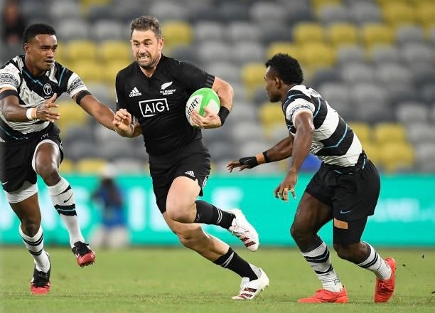 Kurt Baker of New Zealand runs the ball during the Oceania Sevens Challenge match between New Zealand and Fiji at Queensland Country Bank Stadium on...