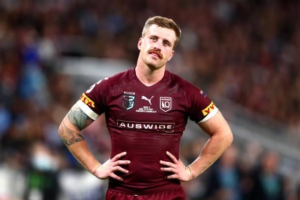 Cameron Munster of the Maroons looks on during game two of the 2021 State of Origin series between the Queensland Maroons and the New South Wales...