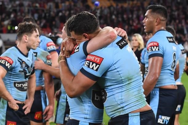 Latrell Mitchell of the Blues celebrates winning game two of the 2021 State of Origin series between the Queensland Maroons and the New South Wales...