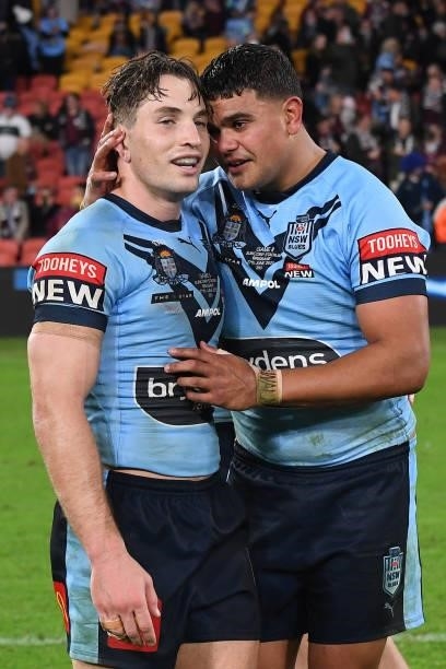 Cameron Murray of the Blues and Latrell Mitchell of the Blues celebrate after winning game two of the 2021 State of Origin series between the...