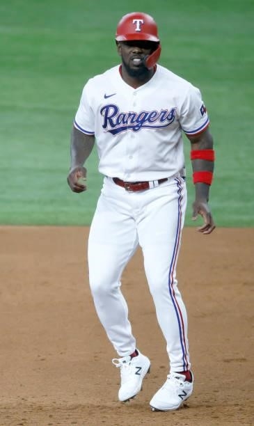 Adolis Garcia of the Texas Rangers leads off at third base against the Kansas City Royals at Globe Life Field on June 26, 2021 in Arlington, Texas.