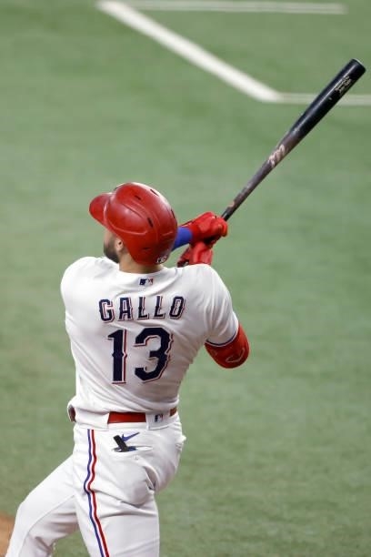 Joey Gallo of the Texas Rangers hits a three-run home run against the Kansas City Royals during the fourth inning at Globe Life Field on June 26,...