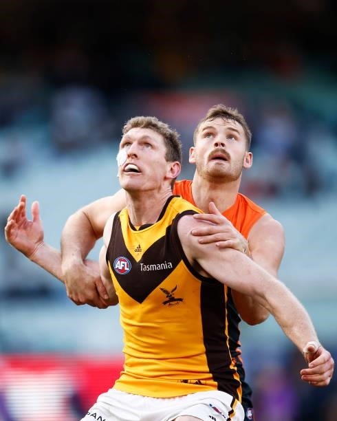 Ben McEvoy of the Hawks and Matthew Flynn of the Giants contest the ruck during the round 15 AFL match between the Greater Western Sydney Giants and...