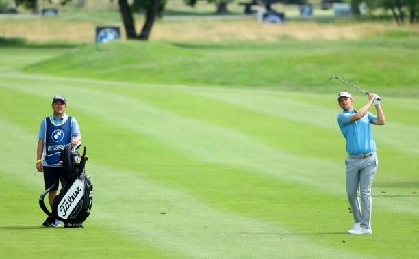 Bernd Wiesberger of Austria plays his third shot on the 9th hole during the final round of The BMW International Open at Golfclub Munchen Eichenried...