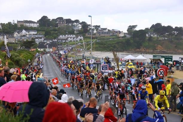 Julian Alaphilippe of France and Team Deceuninck - Quick-Step Yellow Leader Jersey & The Peloton passing through the Plage De Trestel during the...