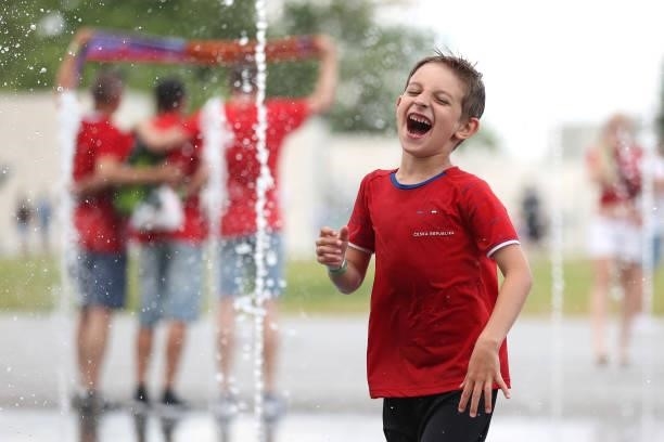 Young Czech Republic fan plays in a fountain outside the stadium prior to the UEFA Euro 2020 Championship Round of 16 match between Netherlands and...