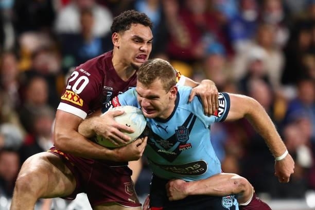 Tom Trbojevic of the Blues is tackled during game two of the 2021 State of Origin series between the Queensland Maroons and the New South Wales Blues...