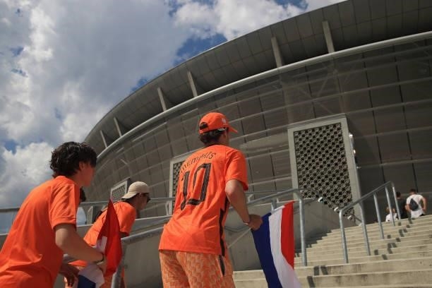 Netherlands fans make their way towards the stadium prior to the UEFA Euro 2020 Championship Round of 16 match between Netherlands and Czech Republic...